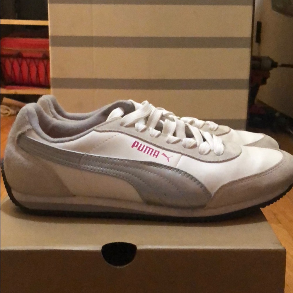 White and pink Puma shoes with grey accents